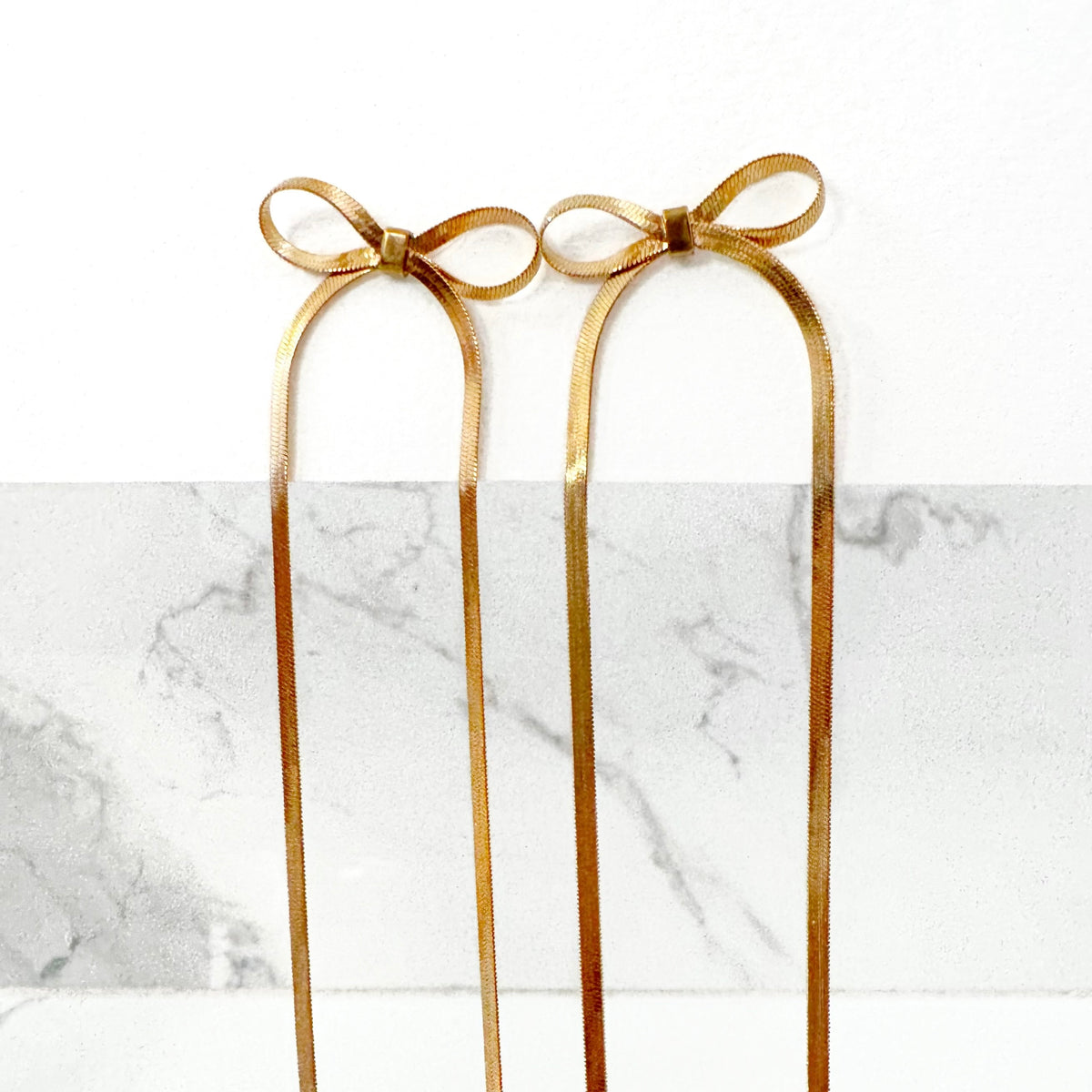 Aretes Moño